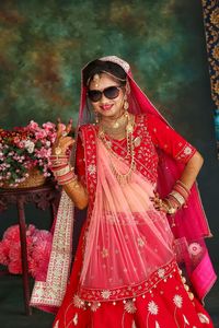 Midsection of woman in traditional clothing standing outdoors