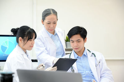 Female doctor working at clinic