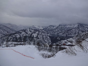 Scenic view of snowcapped mountains against sky