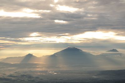 Scenic view of mountains against sky during sunset