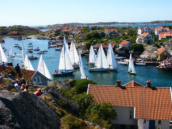 High angle view of sailboats on water