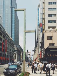 People walking on city street