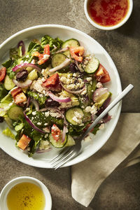 Greek salad with dressing on the side