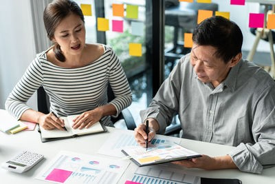 Business colleagues working at office