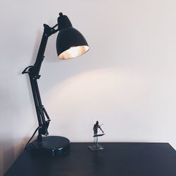 Low angle view of street light against sky