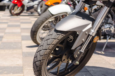 Close-up of bicycle parked on road