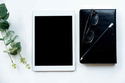 Directly above view of smart phone on table