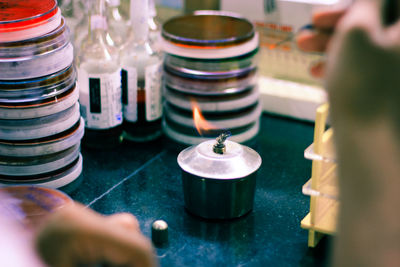 Close-up of person hands experimenting in laboratory