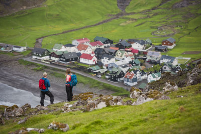 Hikers looking at view