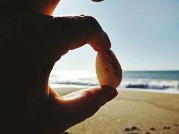 Close up of woman standing on beach