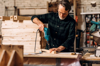 Man working on wood