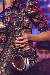 Low angle view of man playing at music concert