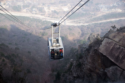 Cable car ride up to the mountains in korea.