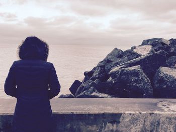 Scenic view of sea against cloudy sky