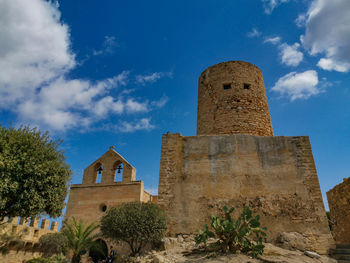 Low angle view of historical building against sky