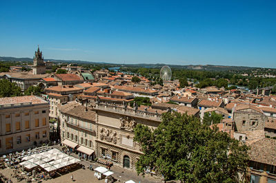 High angle view of townscape against clear blue sky