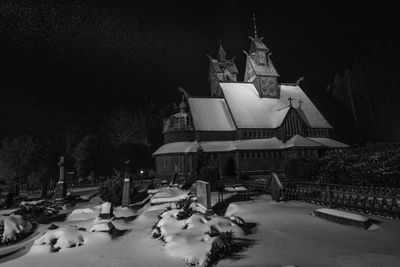 Panoramic view of building at night during winter