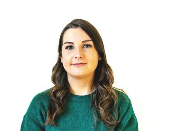 Portrait of woman against white background