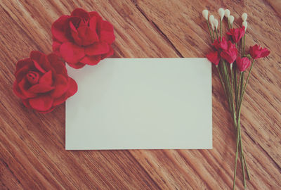 High angle view of rose on table