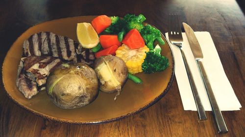 Close-up of food in plate on table