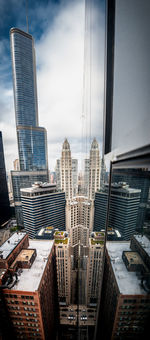 Modern cityscape against sky