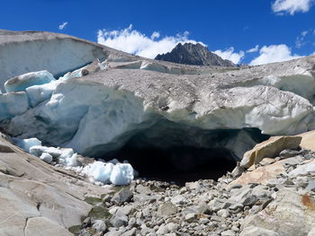 Scenic view of glacier against sky