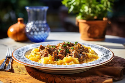 Close-up of food in plate on table