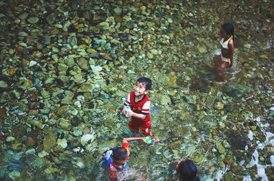 Young woman standing in park