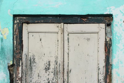 Closed door of old abandoned building