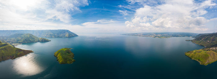 High angle view of sea against cloudy sky