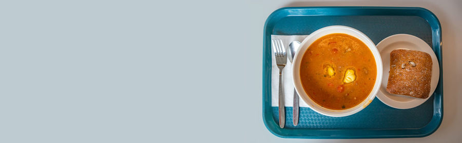 Directly above shot of breakfast on table against white background