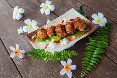 High angle view of various flowers on table