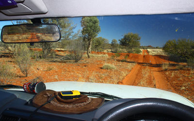 Close-up of car on road