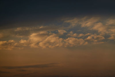 Low angle view of clouds in sky during sunset