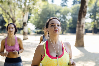 Young sporty women jogging in park