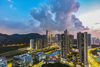 High angle view of buildings against sky during sunset