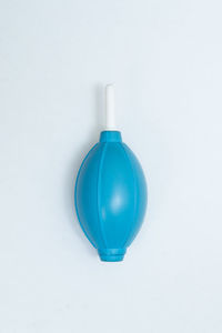 High angle view of blue balloon against white background