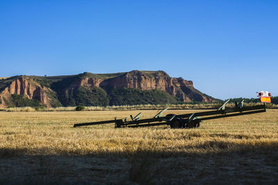 Agricultural equipment on field