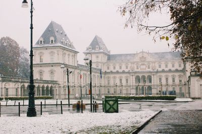 View of buildings in city during winter