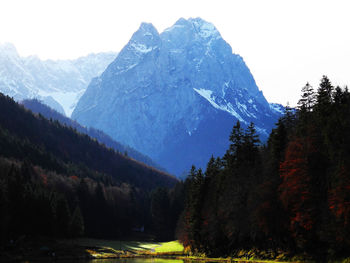 Scenic view of snowcapped mountains against sky