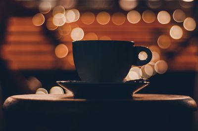 Close-up of coffee cup on table