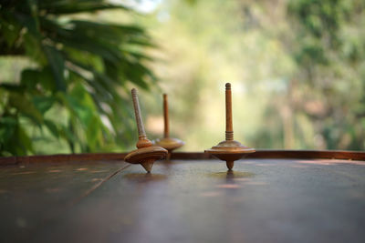 Close-up of cross on table