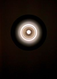 Close-up of illuminated light bulb