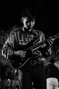 Young man playing guitar