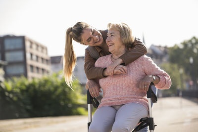 Granddaughter and her grandmother laughing