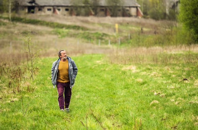 Woman standing on field