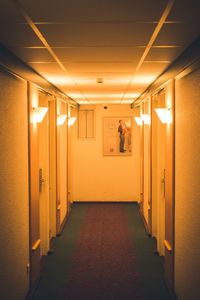 Illuminated corridor of building