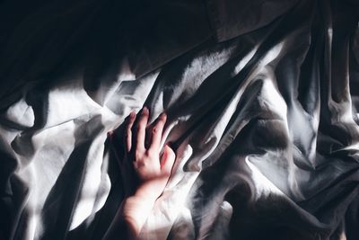 Man relaxing on bed
