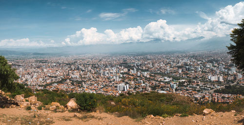 Aerial view of townscape against sky