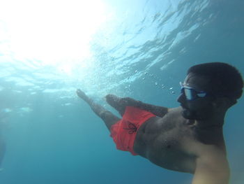 Man swimming in sea